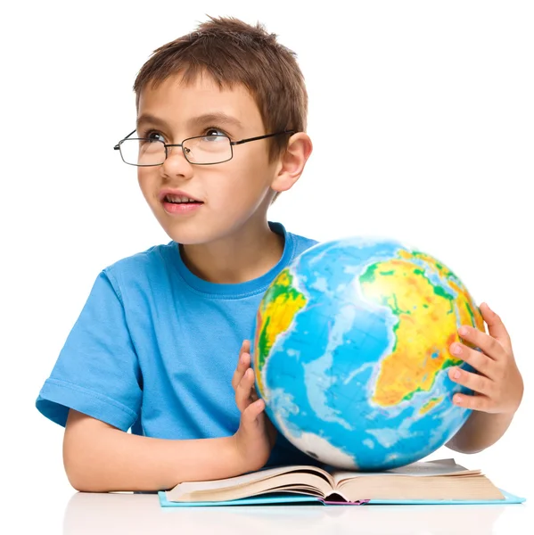 Little boy is holding globe — Stock Photo, Image