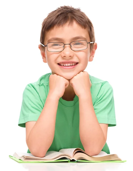 Little boy is reading a book — Stock Photo, Image