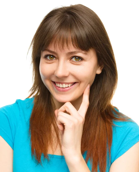 Young woman is supporting her head with hand — ストック写真