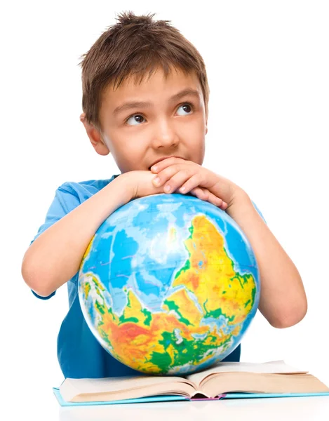 Little boy is holding globe — Stock Photo, Image