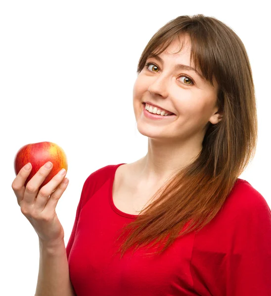 Joven chica feliz con manzana — Foto de Stock