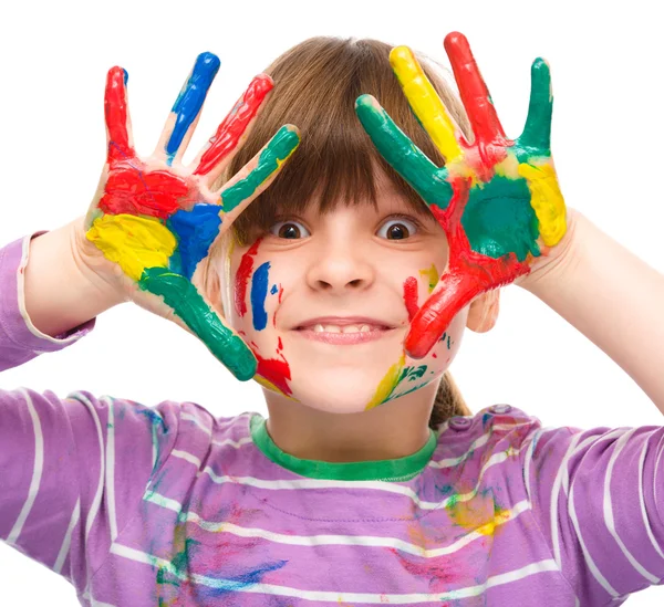 Portrait of a cute girl playing with paints — Stock Photo, Image