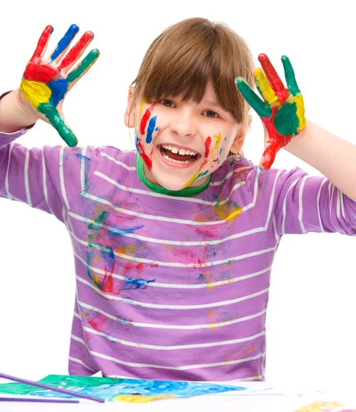 Portrait of a cute girl playing with paints — Stock Photo, Image