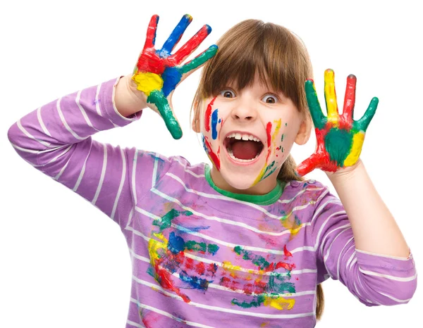 Portrait of a cute girl playing with paints — Stock Photo, Image