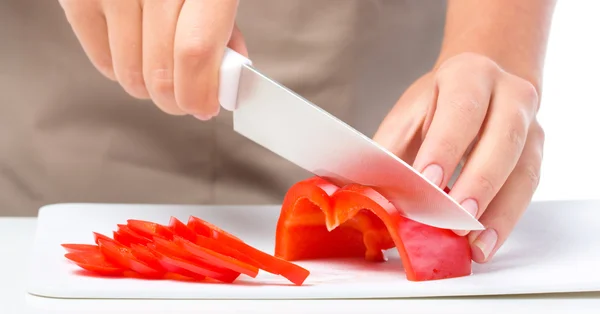 Cook is chopping bell pepper — Stock Photo, Image