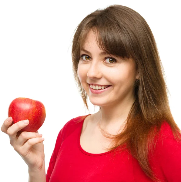 Joven chica feliz con manzana — Foto de Stock