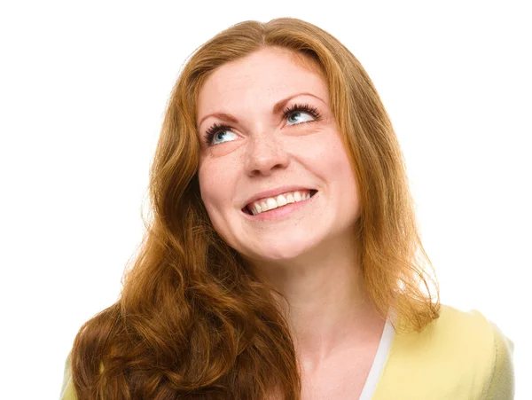 Young happy woman is looking up and smile — Stock Photo, Image