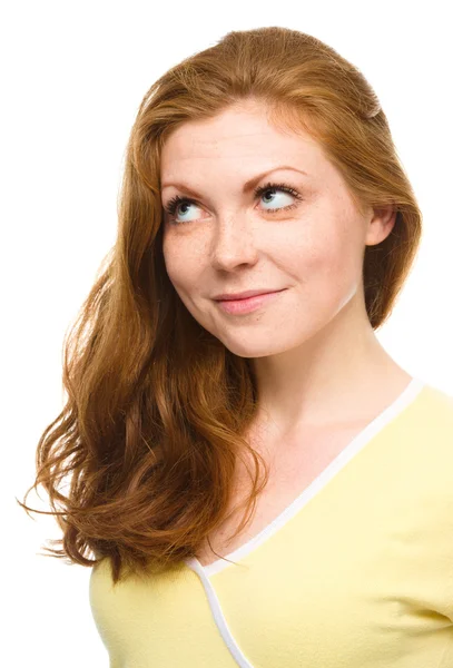 Young happy woman is looking up and smile — Stock Photo, Image