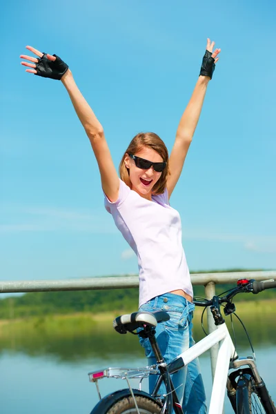 Young woman raised her hands up in joy — Stock Photo, Image