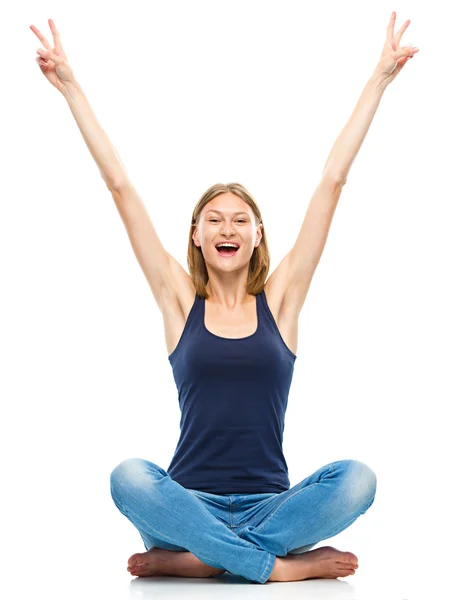 Young woman is raised her hands up in joy — Stock Photo, Image