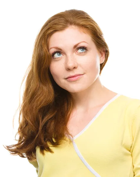 Young happy woman is looking up and smile — Stock Photo, Image