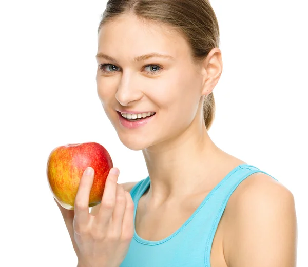 Young happy girl with apple — Stock Photo, Image