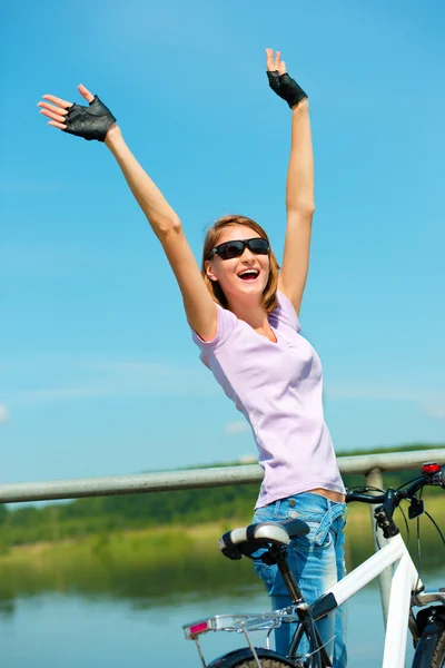 Young woman raised her hands up in joy — Stock Photo, Image