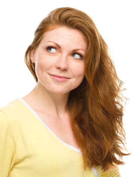 Young happy woman is looking up and smile — Stock Photo, Image