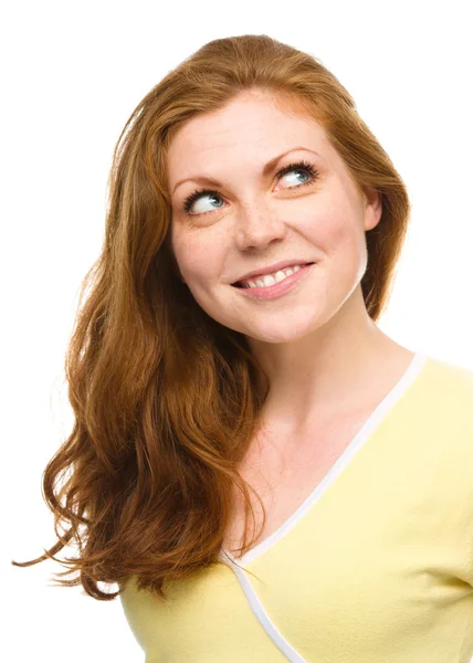 Young happy woman is looking up and smile — Stock Photo, Image