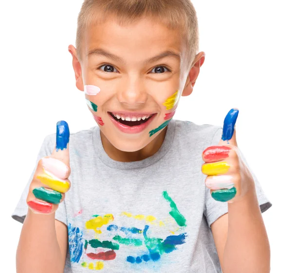 Portrait of a cute boy playing with paints — Stock Photo, Image