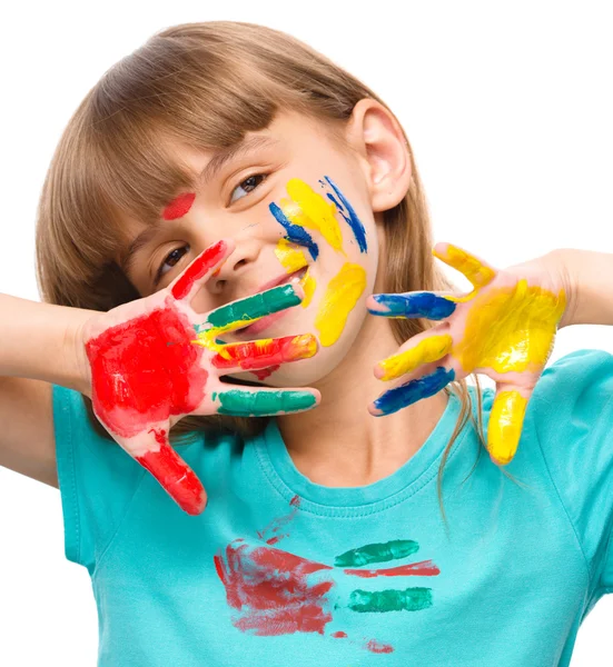 Portrait of a cute girl playing with paints — Stock Photo, Image