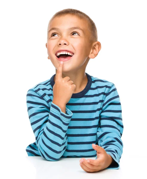 Young boy is daydreaming — Stock Photo, Image