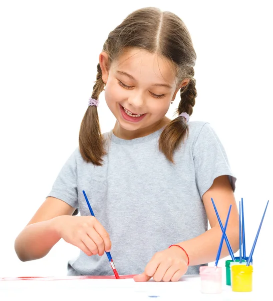 Little girl is painting with gouache — Stock Photo, Image