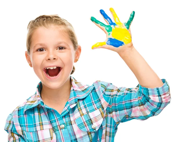 Portrait of a cute girl playing with paints — Stock Photo, Image