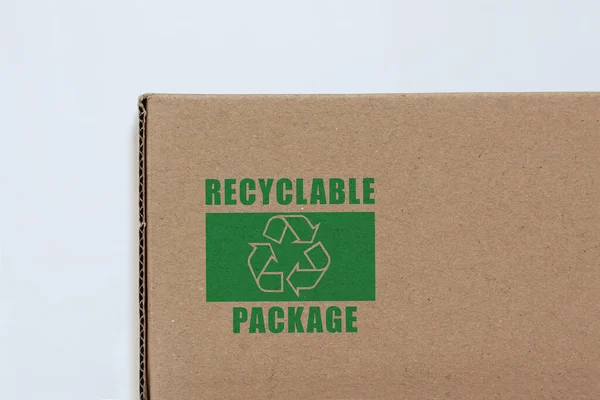 Cardboard Pakage Printed Recycling Symbol Photo White Background — Fotografia de Stock