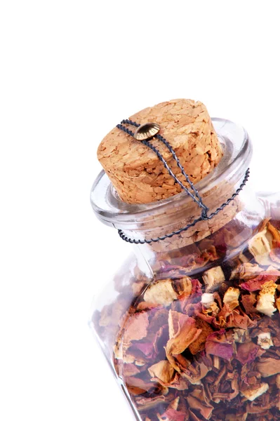 Jar with flower petals — Stock Photo, Image
