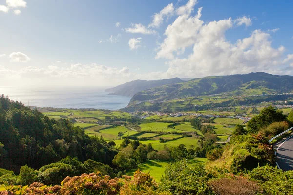 Aerial view to town over ocean — Stock Photo, Image