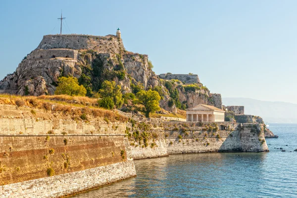 Old fortress walls and clock tower — Stock Photo, Image