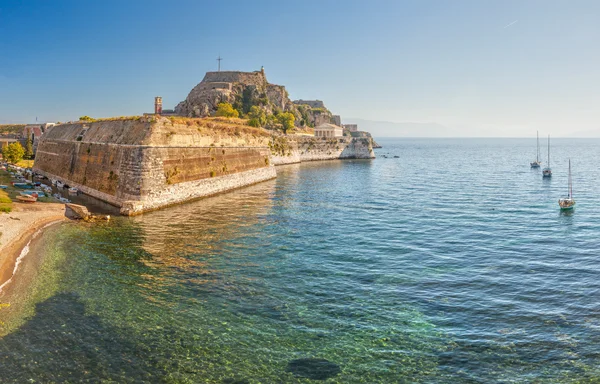 Old fortress walls and clock tower — Stock Photo, Image