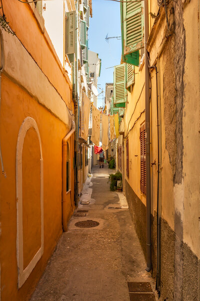 Typical narrow streets of historical city center of Kerkyra, Corfu, Greece