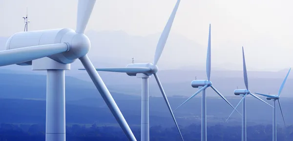 Turbinas de viento con montañas lejanas — Foto de Stock