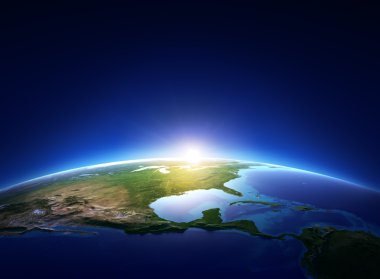 Earth sunrise over cloudless North America clipart