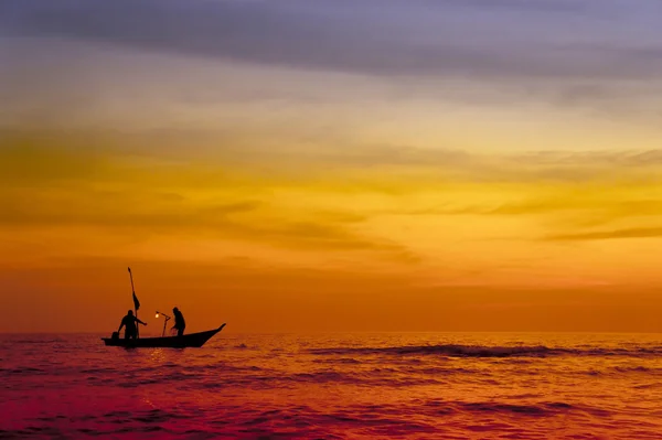 Fishermans at sunset — Stock Photo, Image