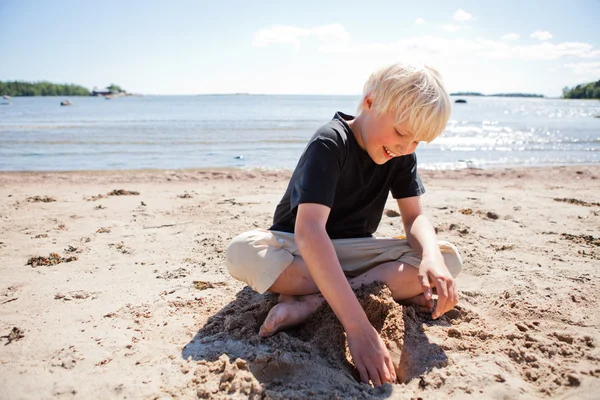 Boy on the beach — Stock Photo, Image