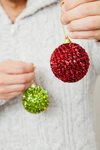 Red and green Christmas baubles — Stock Photo, Image