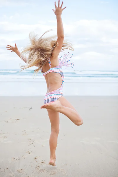 Young girl having fun at beach — Stock Photo, Image