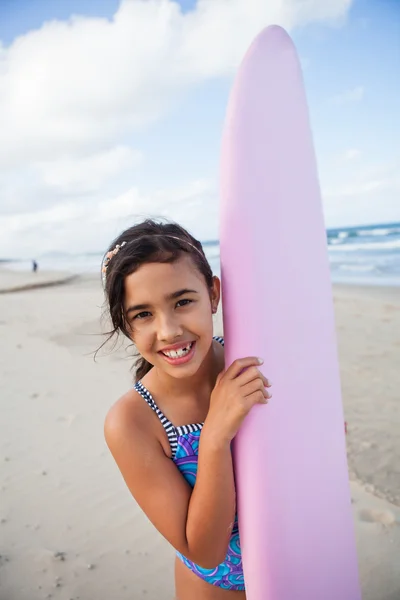 Happy young girl with surfboard — Stock Photo, Image
