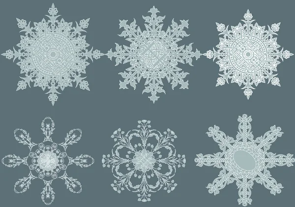 Vector stylish ornate snowflakes — Stock Vector