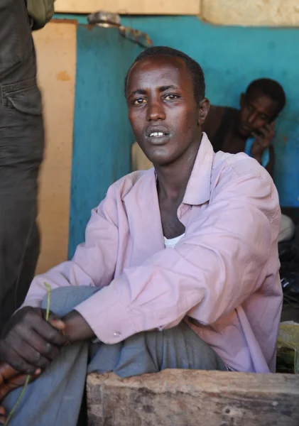 Men use Khat during a meeting in a cafe.