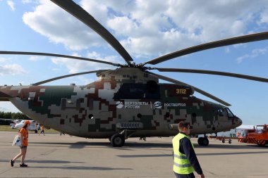  ZHUKOVSKY, MOSCOW REGION, RUSSIA - JULY 20, 2021:Russian heavy military transport upgraded Mi-26T2B Halo helicopter in digital camouflage at the MAKS-2021 International air show