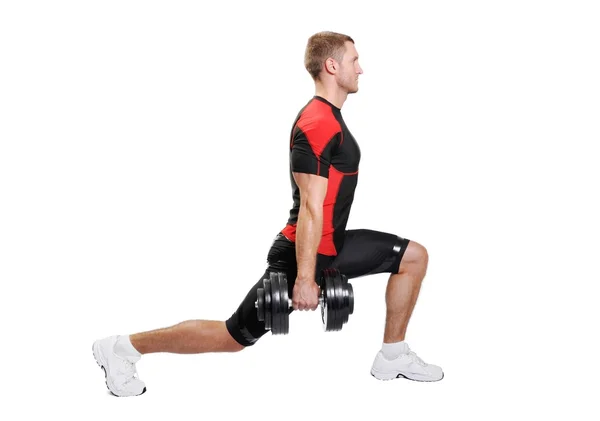 Muskulöser Sportler, der auf weißem Hintergrund trainiert — Stockfoto