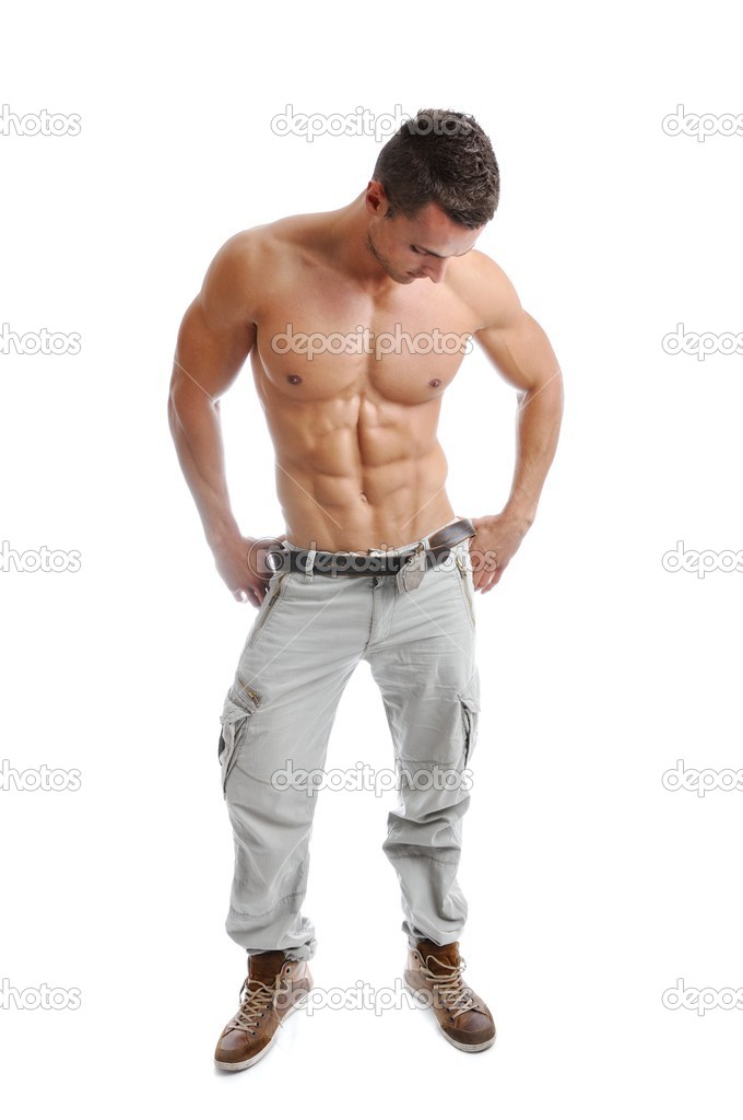 Powerful muscular man posing on a white background