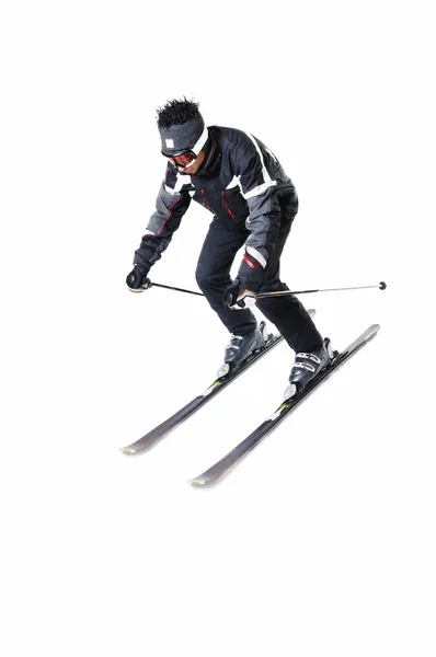 One male skier skiing with full equipment on a white background — Stock Photo, Image