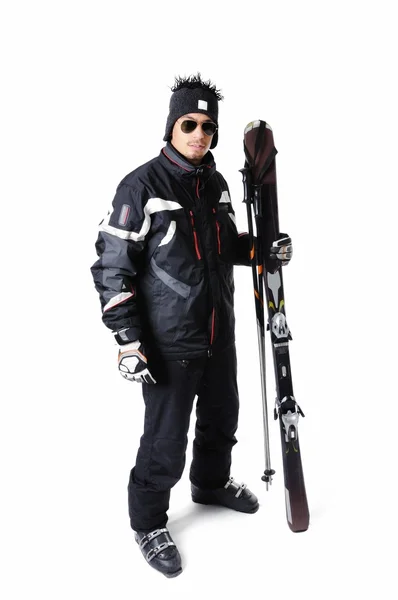 One male skier posing with full equipment on a white background — Stock Photo, Image