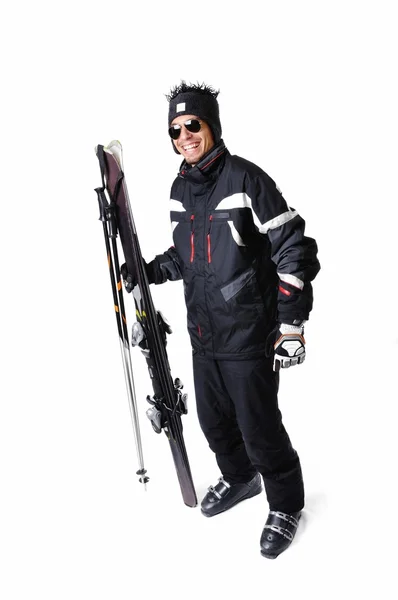 One male skier posing with full equipment on a white background — Stock Photo, Image