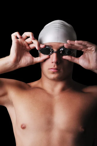 Gespierde mannelijke zwemmer geïsoleerd op zwart — Stockfoto