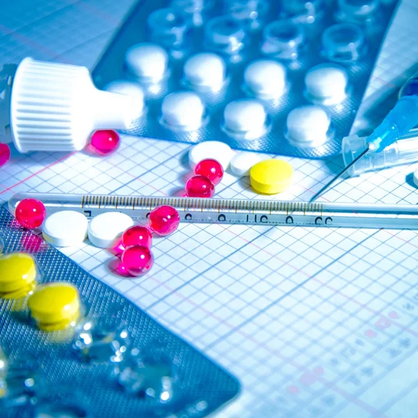 Medizinischer Hintergrund Pille Temperatur-Messgerät Spritze — Stockfoto