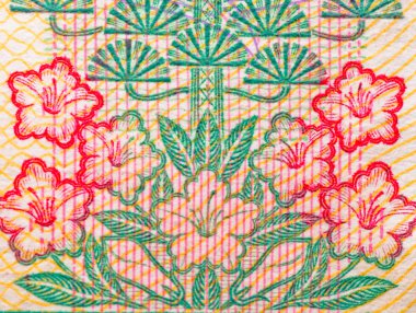 Çin parası arka plandaki makro çiçek dokusunu tırmalıyor