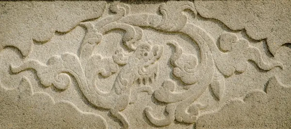 Chinese stone dragon relief — Stock Photo, Image