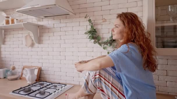 Woman Relish Coffee Morning Time Kitchen Holding Cup Looking Window — 비디오